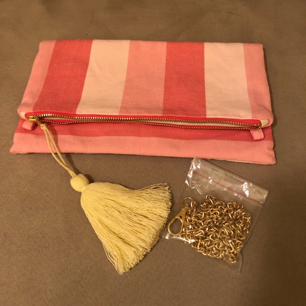 Tribe Alive fabric fold over clutch.